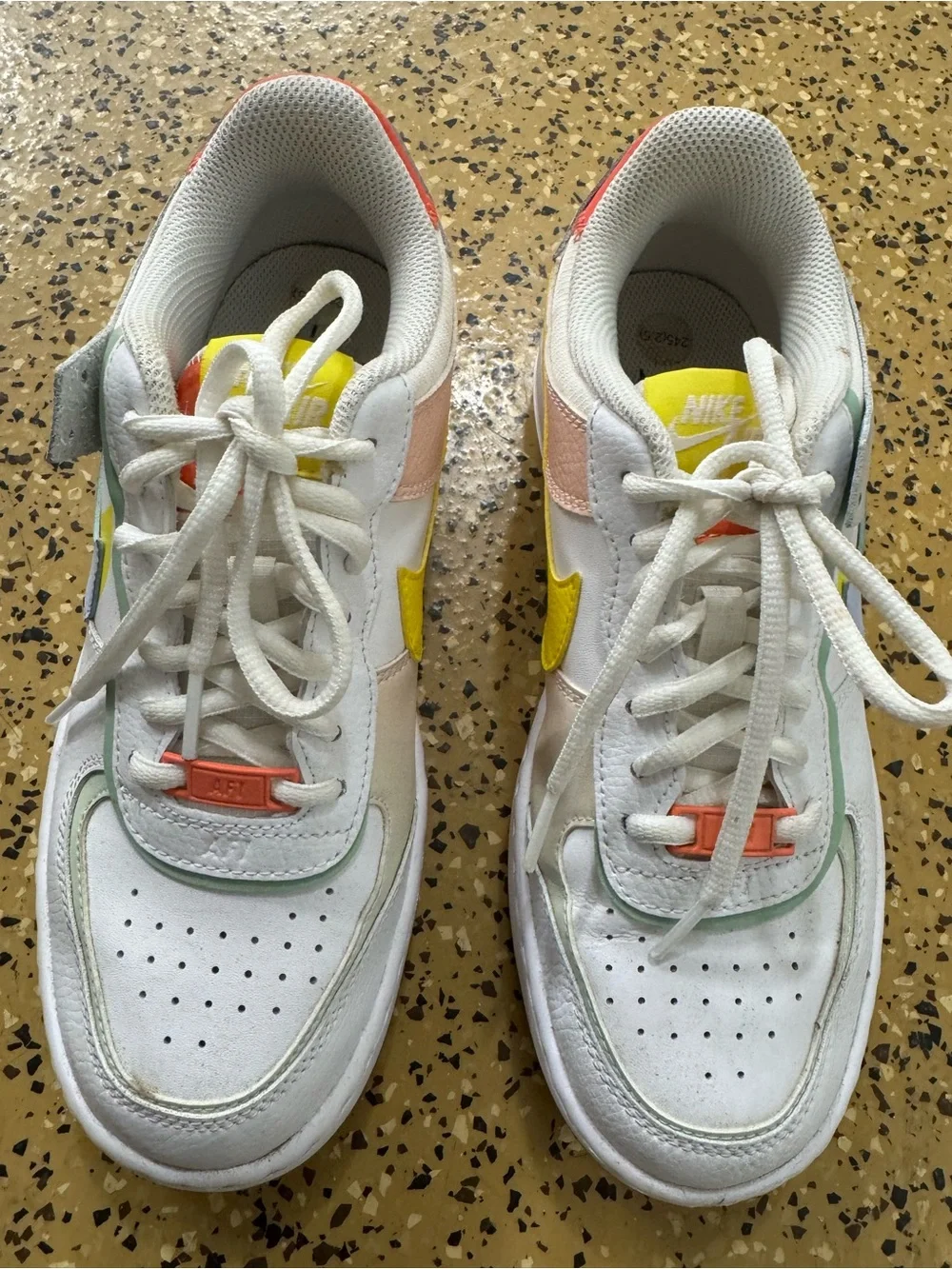 Nike Kids White Sneakers with Pink, Orange and Yellow Accents